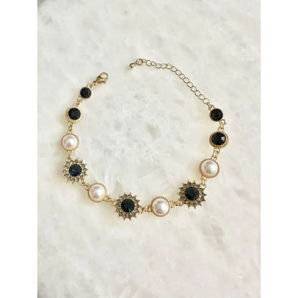 Dark blue sapphire rhinestone with gold chain-link with pearl regal style bracel